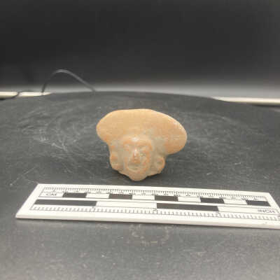 Votive figurine head