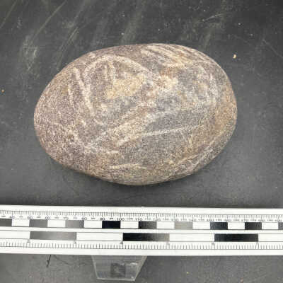 Incised stone (?)