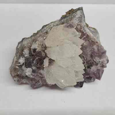 Calcite on Amethyst