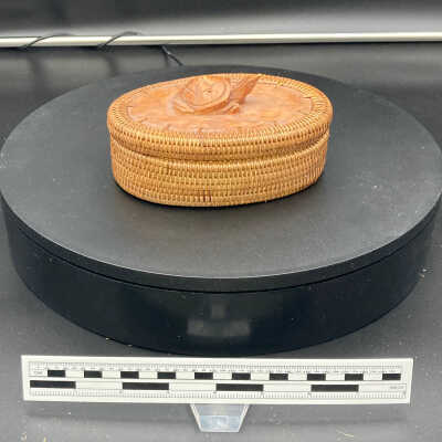 Basket with carved turtle lid