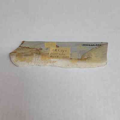 Reverse side - various residue from masking/scotch tape. One piece reads "Arroyo Picture Rock- OR"