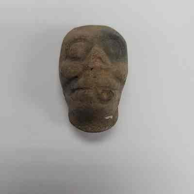 Human Head Votive