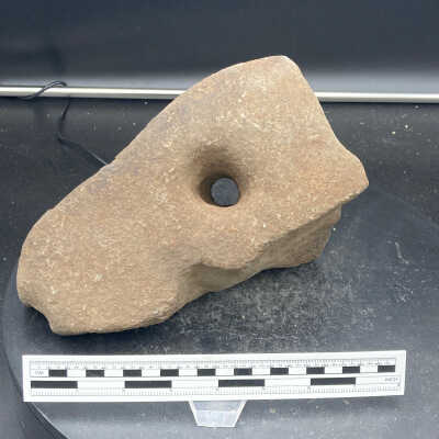 Rock with drill hole (?)