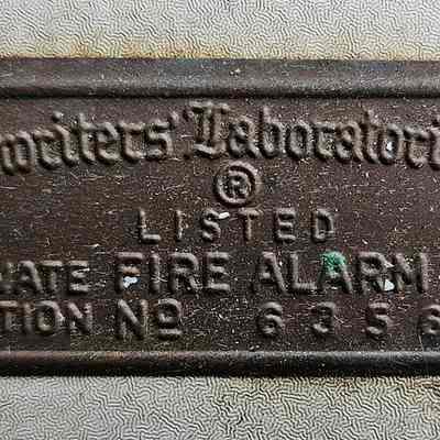 Underwriters' Laboratories placard. Identifies the box as a private fire alarm box linked to station no. 635611.