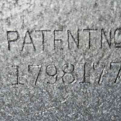 Die Mark #2: The image shows a metal surface engraved with the text "PATENT NO 1798177."