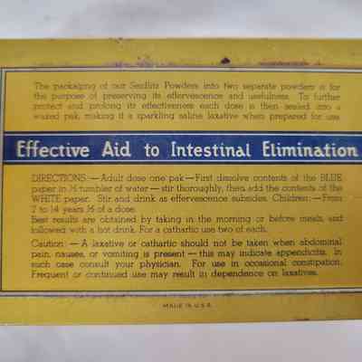 The image shows a vintage Seidlitz Powders label with usage instructions and a warning about laxatives