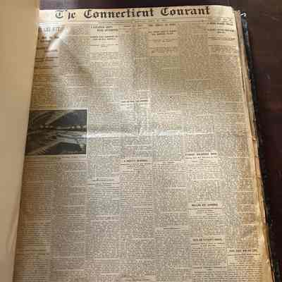 An inside picture showing The Connecticut Courant publication.: This is a cover page from The Connecticut Courant from 1904. There are seven columns of news with multiple articles per column.