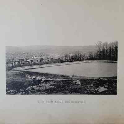 Photo caption reads: VIEW FROM ABOVE THE RESERVOIR.
