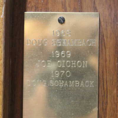 Closeup of righthand label: Reads "1968 Doug Schambach 1969 Joe Chichon 1970 Doug Schamback"