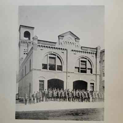 Photo caption reads: ENIGINE HOUSE. From threadcity.us: "Bank St. Headquarters was built in 1886 and a year later became home to Alert Hose Company Number One and Excelsior Hook and Ladder Company."