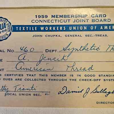 A. Jencik's 1959 Union Card, Signed by Local Secretary Betty Tianti: The image shows a 1959 membership card from the Connecticut Joint Board of the Textile Workers Union of America, which belongs to a member named A. Jencik, who works in the Synthetic Throw Department at the American Thread plant. The card displays a union logo on the left side, featuring the text “Textile Workers Union of America AFL-CIO” surrounding a circular emblem. John Chupka is noted as the General Secretary-Treasurer, and the card certifies that the member is in good standing, with dues collected through the check-off system. Signatures at the bottom include Betty Trianti as Local Union Secretary and Daniel J. Gallagher as Director.