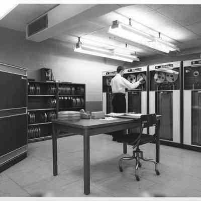 Textile Mill Worker Operating Computers