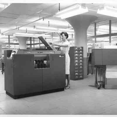 Textile Mill Office Worker Operating Photocopy Machine