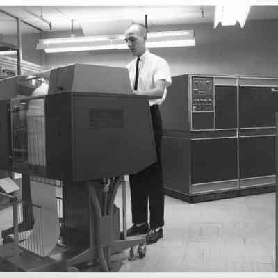 Textile Worker Operating Computers