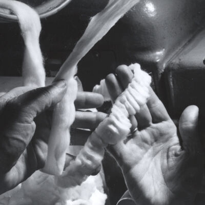 Photograph of a Textile Mill Worker Processing Sliver, American Thread Company