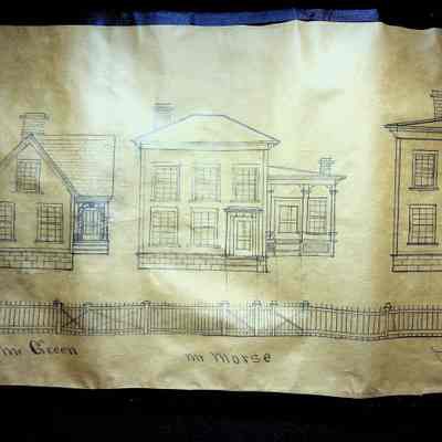 An image from the street view of Baby Lane/Valley Street. Two full houses can be seen from this image: Mr. Green's and Mr. Morse's. Randolph Robinson's house can be partially seen on the right side.: The first house on the left is Mr. Green's house. This is a smaller L-shaped house with a front-facing door on the right side of the house. Three windows can be seen from the street with two on the ground floor and one on what is likely the attic. There is a chimney in the center of the house, possibly towards the back. The next house, which is a bit bigger than Mr. Green's house is owned by Mr. Morse which stylistically, is very similar to Randolph Robinson's from the previous drawing description though it is roughly half the size with three windows on the second story and two windows to the left of the door which sits on the right side of the first story. On the right side of the image, we can see the left side of Randolph Robinson's house up to where the main door sits as described in the previous photo.