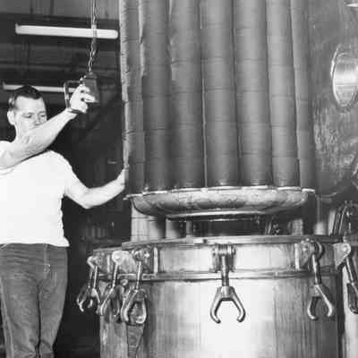 Textile Mill Worker Operating Dye Vat