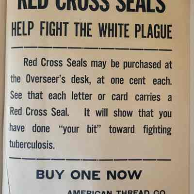 A beige piece of paper with large black lettering.