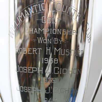 Close up of Front of Trophy: Reads "Willimantic Country Club Golf Championship Won By Robert H. Mustard 1938 Joseph J. Chichon 1939 Joseph J. Chichon 1940 Joseph J. Chichon 1941"