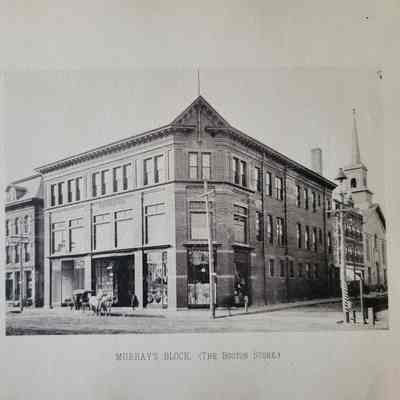 Photo caption reads: "MURRAY'S BLOCK. (THE BOSTON STORE)" Murray's Block, consisting of the Murray Building which was completed in 1894, was the home of the Boston Store. This was a large-scale department store, and the first of its kind in Willimantic.
