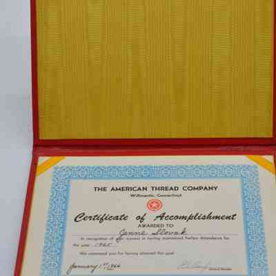 The image shows a "Certificate of Accomplishment" from The American Thread Company