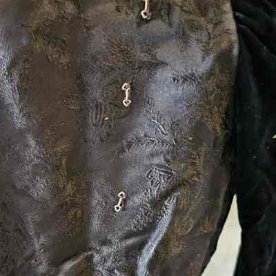 Detail from front right of garment.