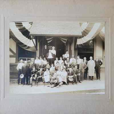 Photograph of a Group in Front of Dugan Hall c. 1900