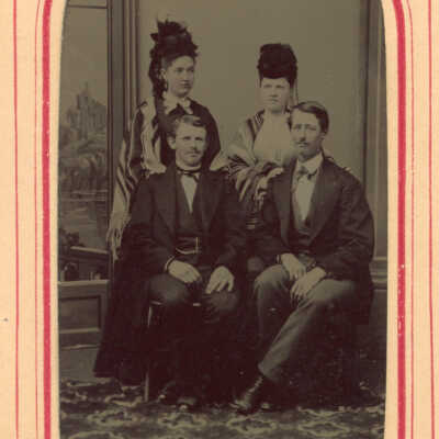 Unknown Subject - May 14, 1873 [Facial recognition software identified man seated on right as Israel Holt the woman behind him is likely his wife]