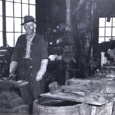 Charles 'Tink' Pherson inside his blacksmith shop - Amherst, N.H.