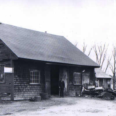 Charles 'Tink' Pherson outside his blacksmith shop - Amherst, N.H.