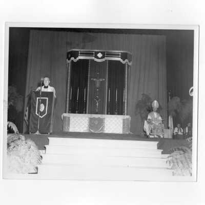 Pontifical mass for centennial celebration with Robert J. Gannon, S.J., giving sermon and Bishop Hugh Lamb.