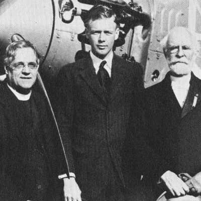 Photos of: Charles Lindbergh arriving at Philadelphia Navy Yard to receive degree of master of science in aeronautics; Lindbergh with Albert G. Brown, S.J. in cap and gown in conjunction with ceremony and dedication of Barbelin Hall on November 13, 1927