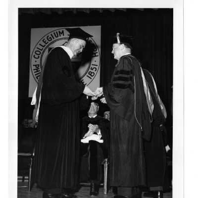 Convocation and dedication of Villiger (later Post) Academy of Food Marketing with William F. Maloney, S.J. conferring honorary degree to William B. Murphy