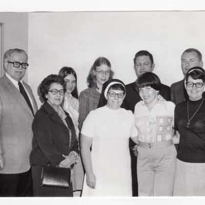 George Beichl and others with students from Hallahan High School as part of Chemistry Department's Science Motivation Program, c. 1972.