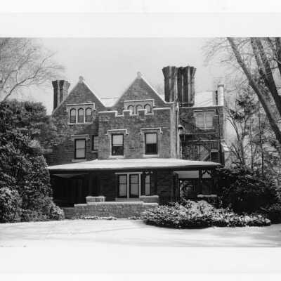 View of west side of Wolfington Center (formerly Gest Estate, Neumann Hall) in snow before exterior renovation and porch rebuilding.