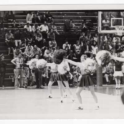Women cheerleaders at basketball game.