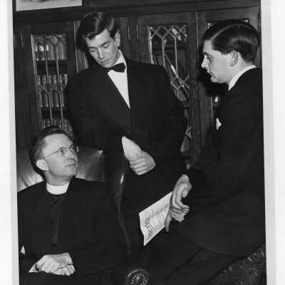Matthew G. Sullivan, S.J. and two members of Villiger Debating team at during debate with Oxford.