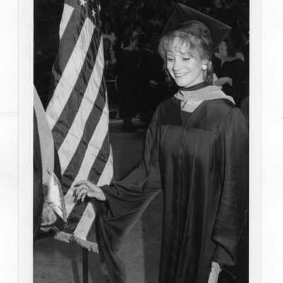 Views of graduating students receiving diplomas.
