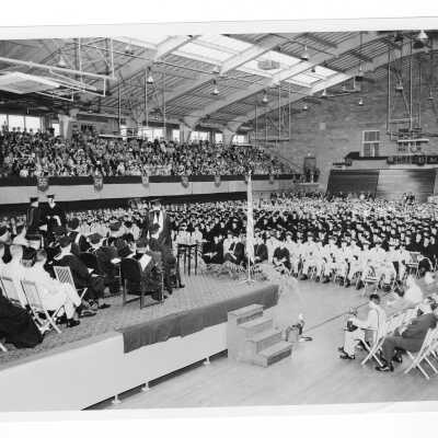 Interior view of 1956 graduation/commencement ceremony in Field House.