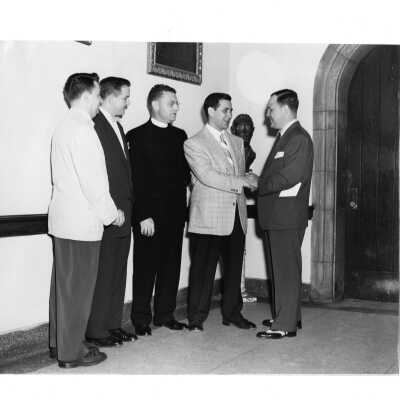 Alumni homecoming event, June 4, 1953, with Edward G. Jacklin, S.J., William Ariano and others.