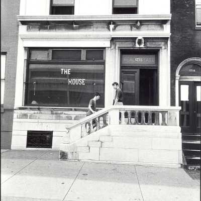 Two students in front of "The House" or SJC Commune at 17th and Girard Streets in Philadelphia as part of summer outreach/community service project.