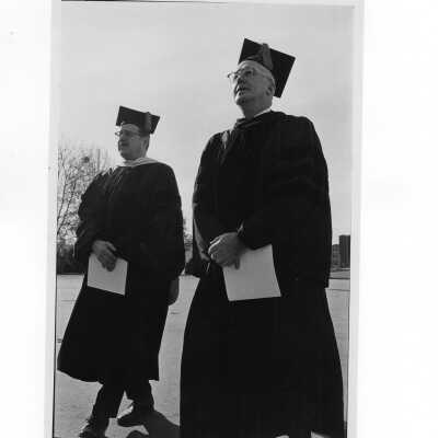 Inauguration of President Terrence Toland, S.J., November 14, 1968. U.S. Senator Hugh Scott of Pennsylvania and James H.J. Tate, Mayor of Philadelphia walk in academic procession to Field House.
