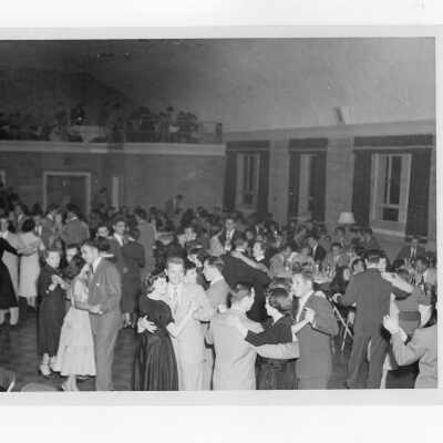 View of alumni association dance in Flanigan auditorium, c. 1957.