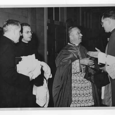 Conclusion of pontifical mass for centennial celebration held in Field House, with Monsignor Francis Furey, Edward G. Jacklin, S.J., Amleto Giovanni Cicognani, and Monsignor Joseph McShea.
