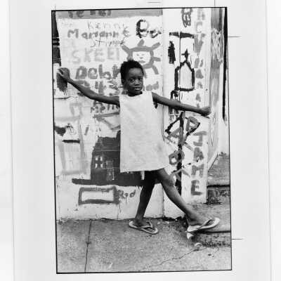 Photograph of young girl living near "The House" or SJC Commune at 17th and Girard Streets, Philadelphia.