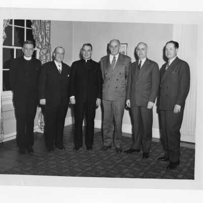 Reunion of several New Jersey alumni--Cornelius O'Brien, Frank Casey, Godfrey Schnoth, and James Gallagher--along with John J. Long, S.J., and Vachel Brown, S.J., December 4, 1947.