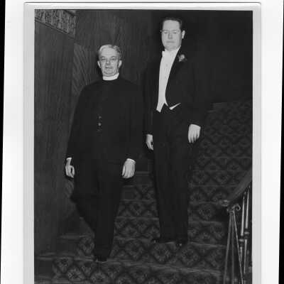 Thomas J. Love, S.J., and alumni member alumni association formal supper dance, c. 1939.