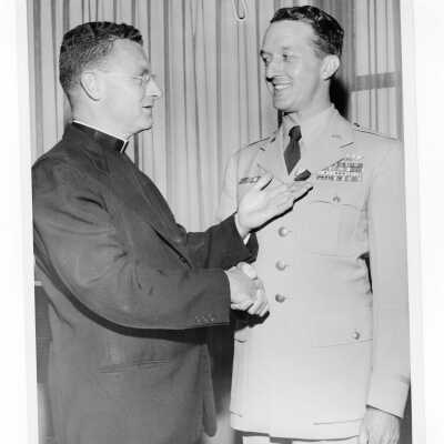 Edward G. Jacklin with Colonel Raymond Gehrig who received the president's medal during 1955 graduation/commencement ceremony.