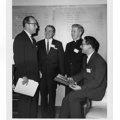 Thomas McCabe, Jr., John J. Spillane, Theodore Purcell, S.J., John Meli at Business Ethics Workshop at SJC, December 4, 1964.