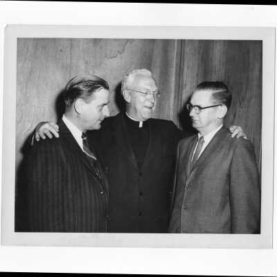 J. Joseph Bluett, S.J., with members of alumni association, Charles Krull and Tom Carmody, c. 1959.